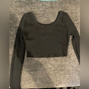 small, black cropped black long sleeve